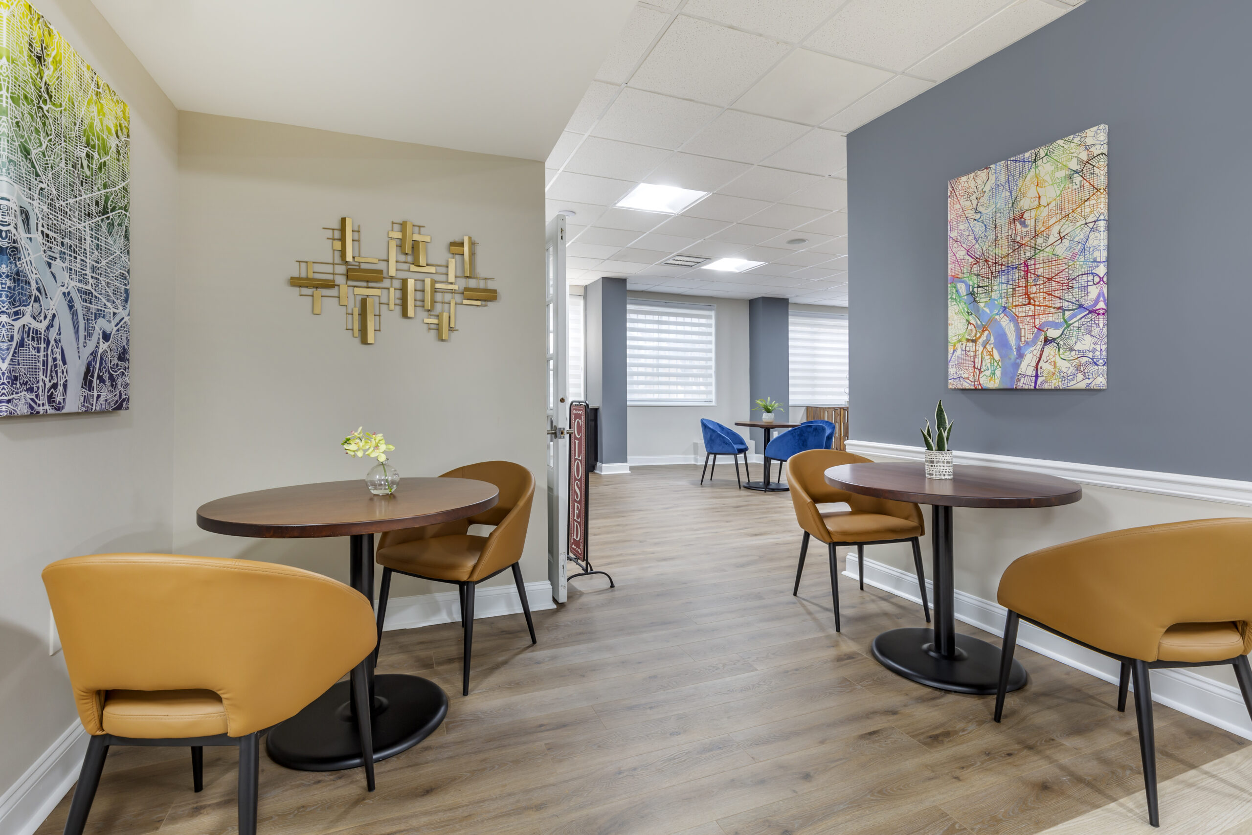Common area with orange chairs