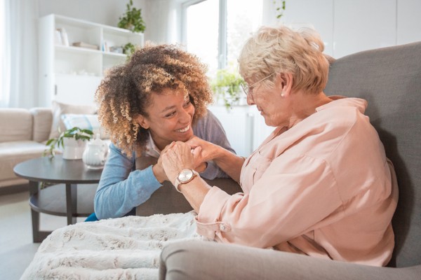 A team member shows a senior resident extra attention.